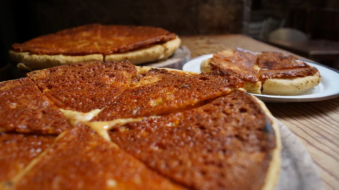 ¿Antojo de una pizza exótica? Visita Pizzas del Perro Negro